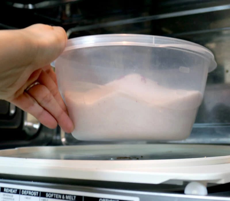 Place a microwave-safe container with Flower Drying Art™ Silica Gel and flowers in the microwave.